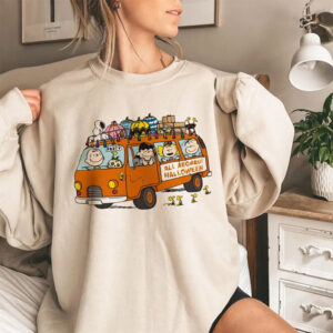 Peanuts Halloween Snoopy & Charlie Brown Crewneck Comfort Colors Tee Peanuts Halloween Snoopy & Charlie Brown Crewneck Comfort Colors Tee