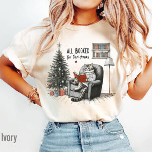 All Booked for Christmas Bookish Cat Comfort Colors Shirt 1 PersonalizedShirts.net