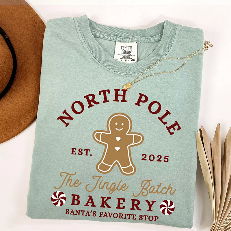North Pole Bakery Gingerbread Christmas Comfort Colors Tee North Pole Bakery Gingerbread Christmas Comfort Colors Tee